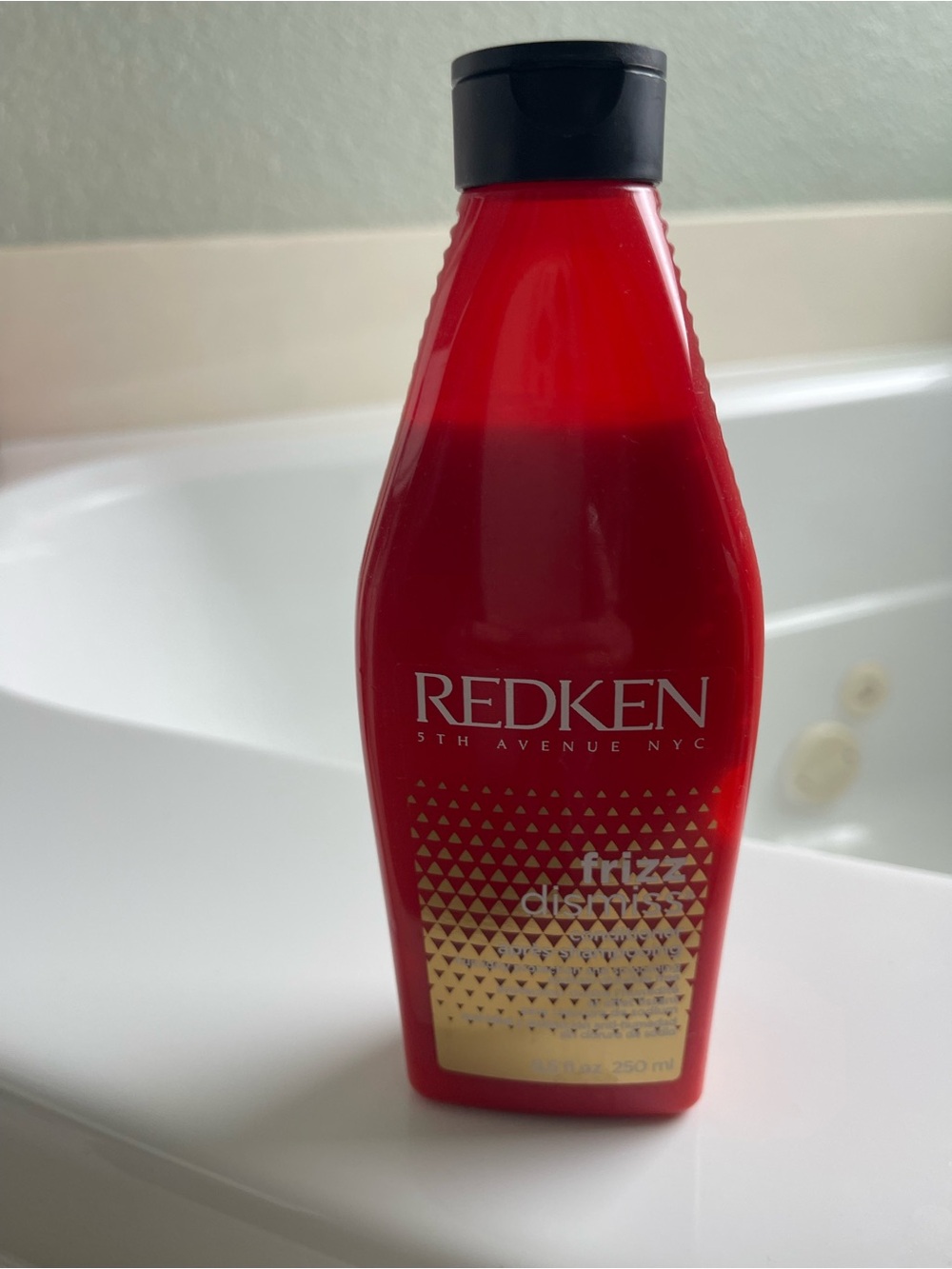 Redken Frizz Dismiss Hair Care Bottle - Red with Black Cap
